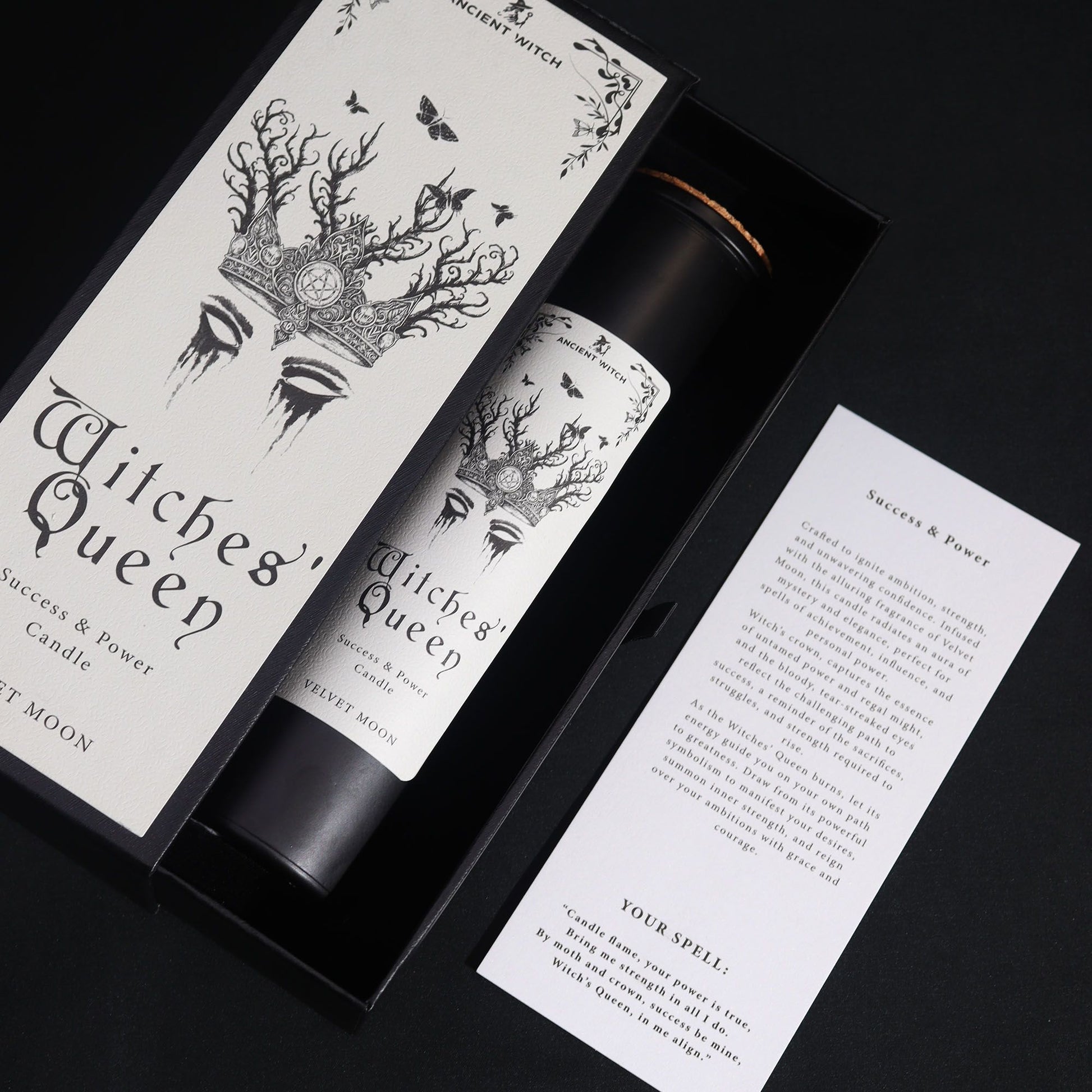 Witches' Queen candle packaging with decorative design and information card on a black background