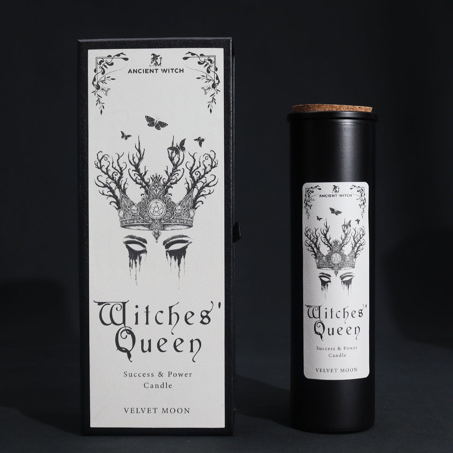 Witches' Queen candle packaging with black and white design on a dark background