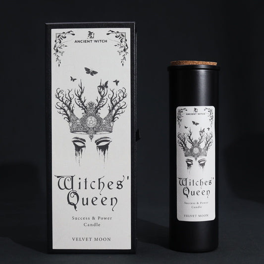 Witches' Queen candle packaging with black and white design on a dark background
